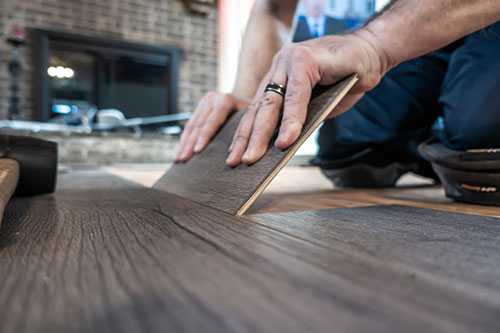 Man installing floor